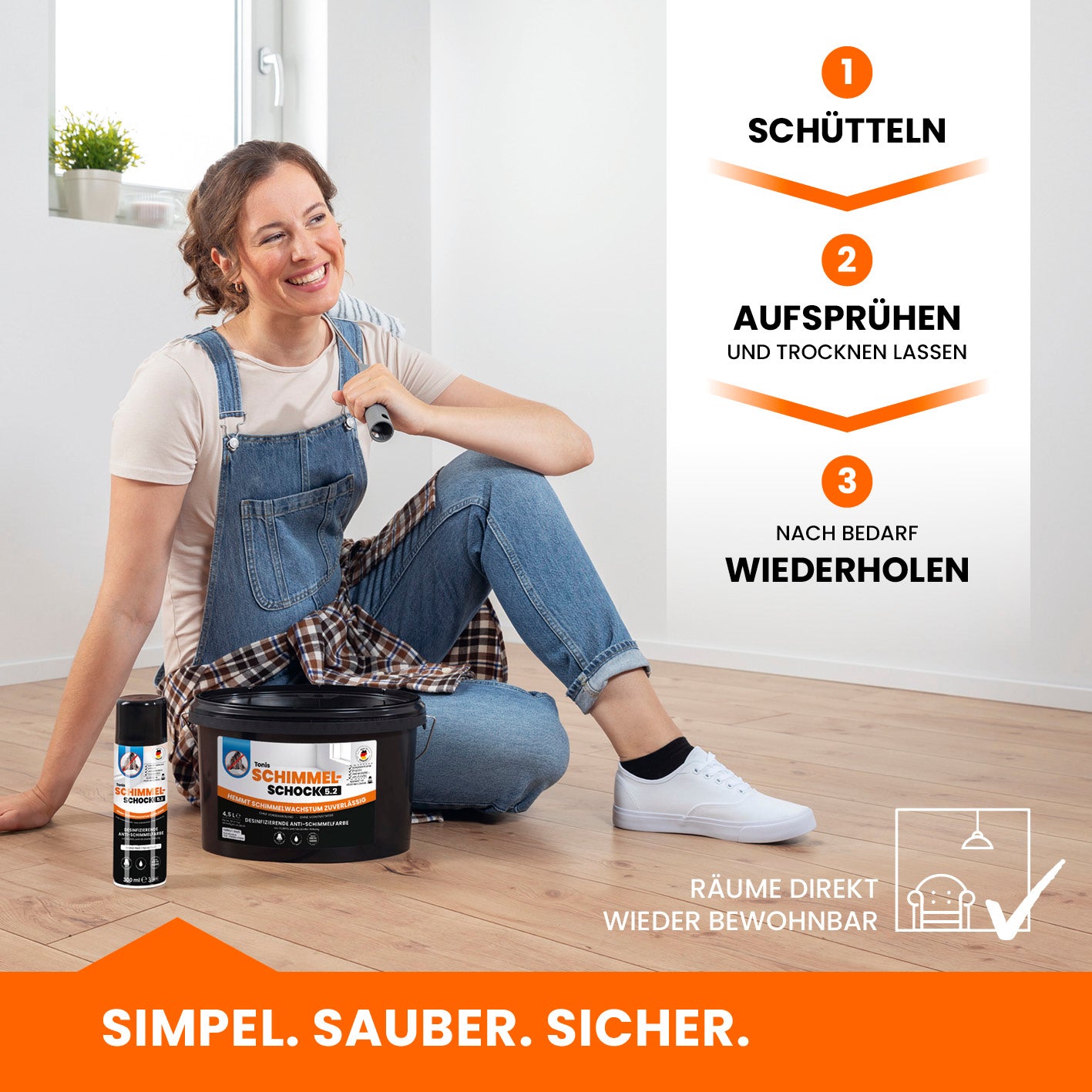 Eine Frau sitzt mit den Produkten von Schimmelschock auf dem Boden und trägt ihre Arbeitsklamotten. 